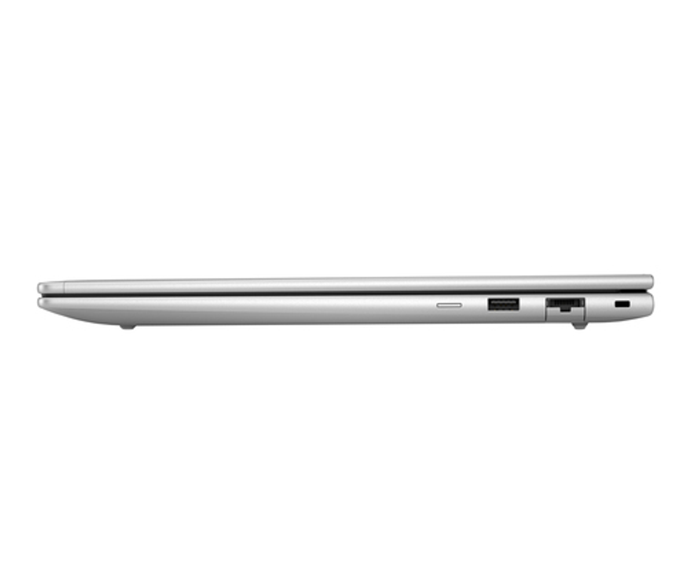 Portátil plateado cerrado de perfil lateral mostrando puertos USB.