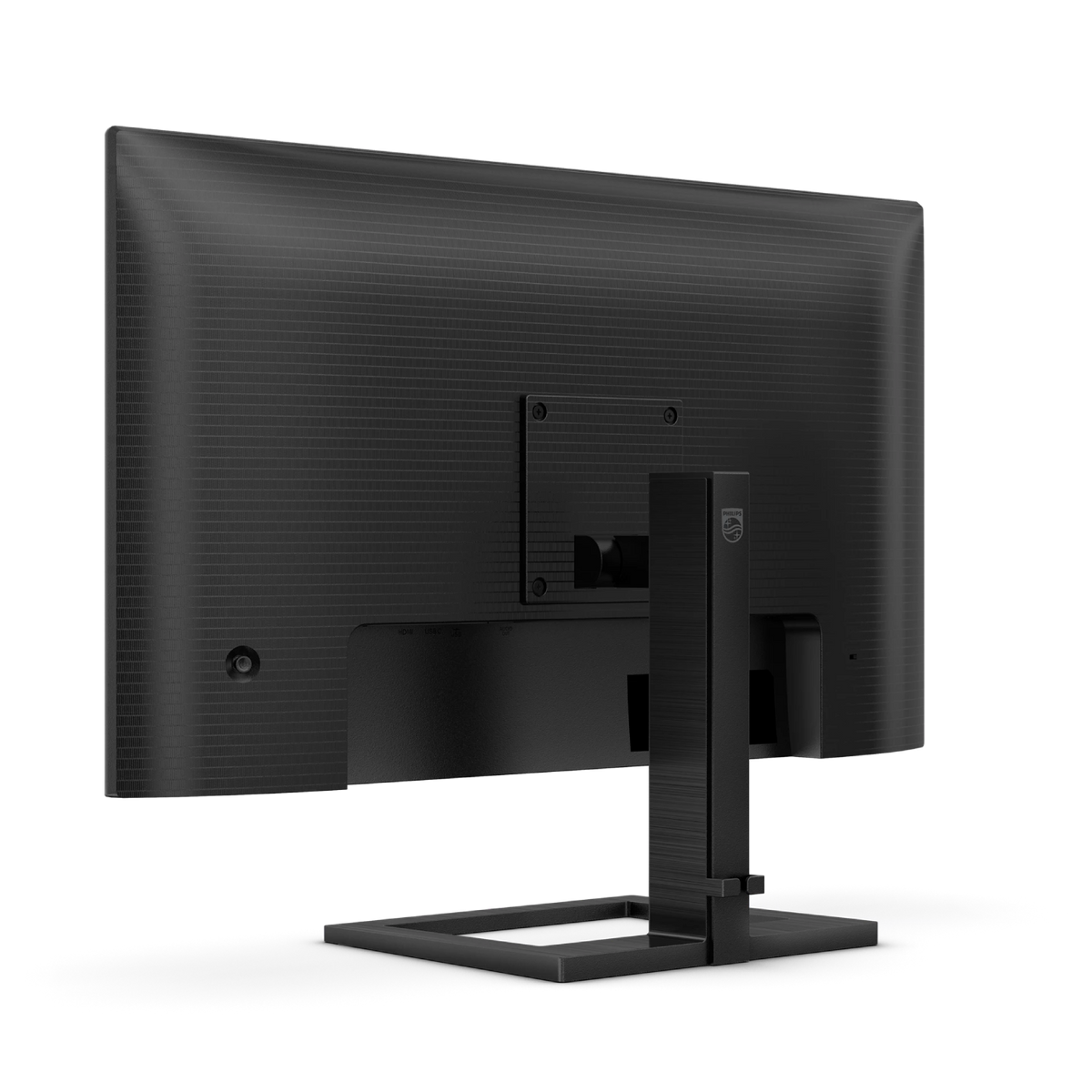 Achterkant van een zwarte monitor met gestructureerd oppervlak en standaard.