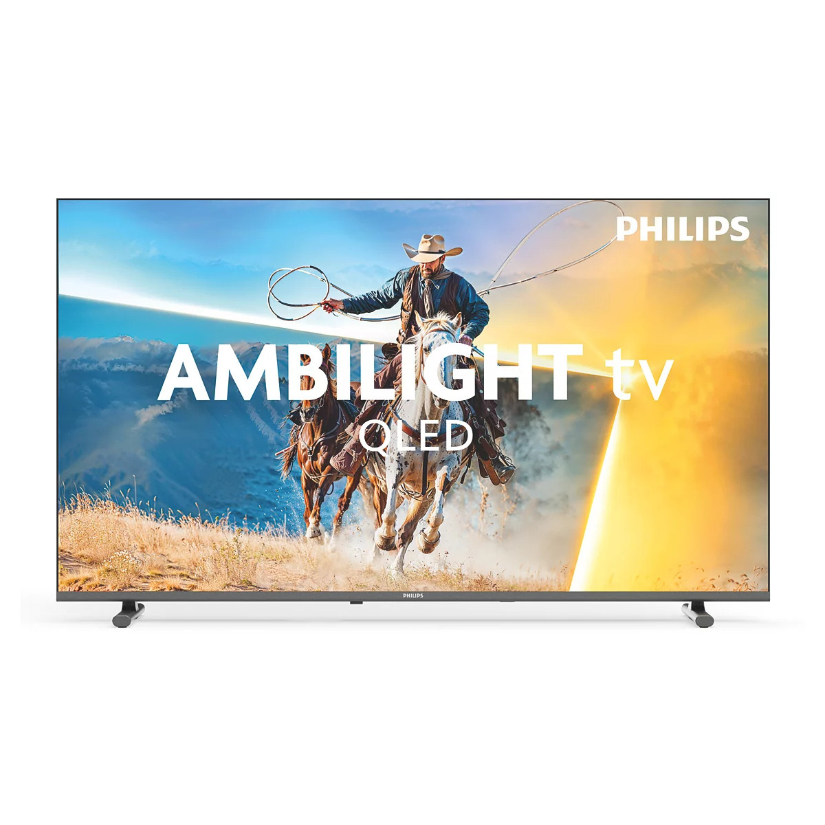 Un vaquero a caballo con un lazo frente a un paisaje dramático y un televisor Philips.