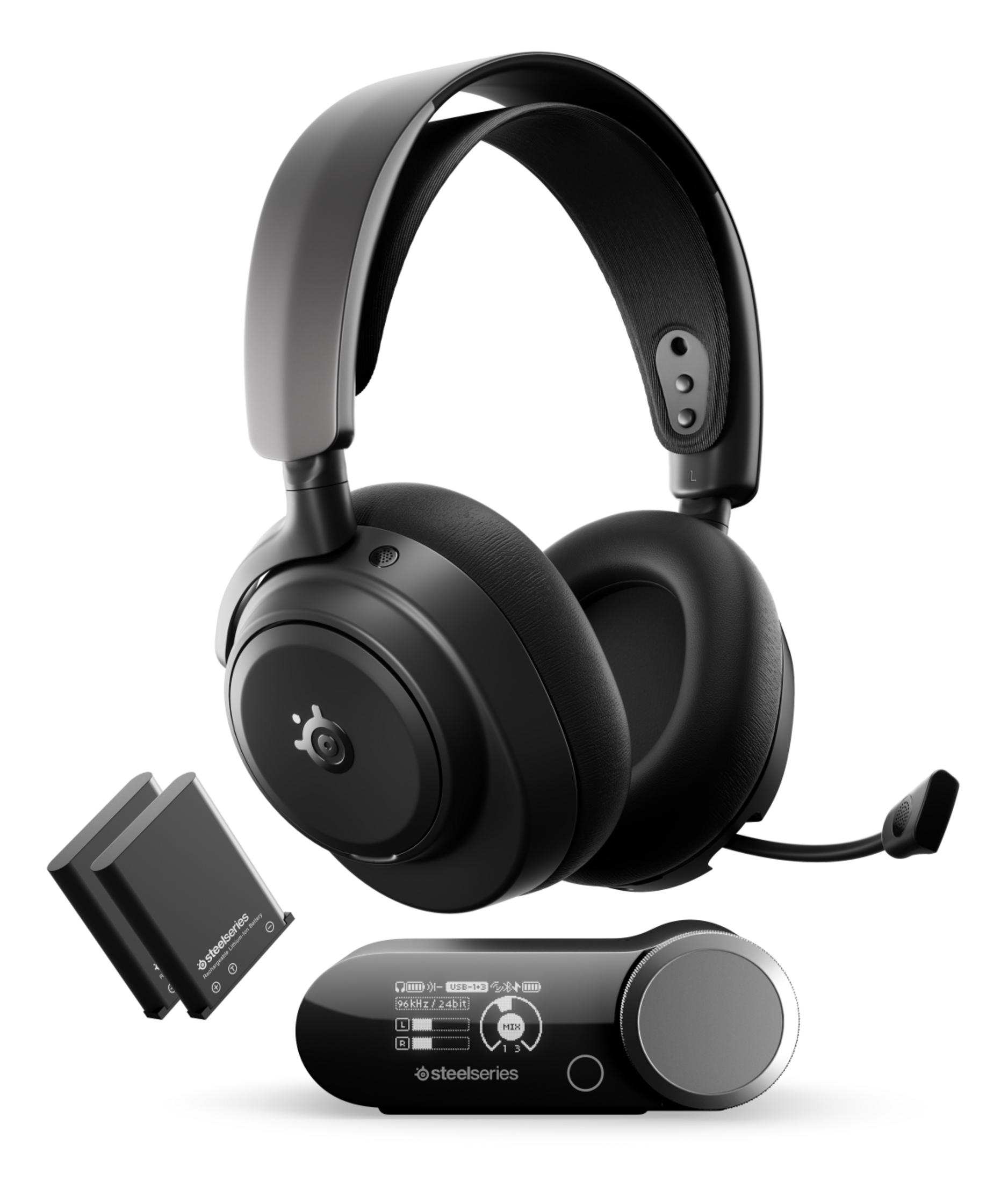 Cuffie Steelseries nere, due batterie e un trasmettitore con display.