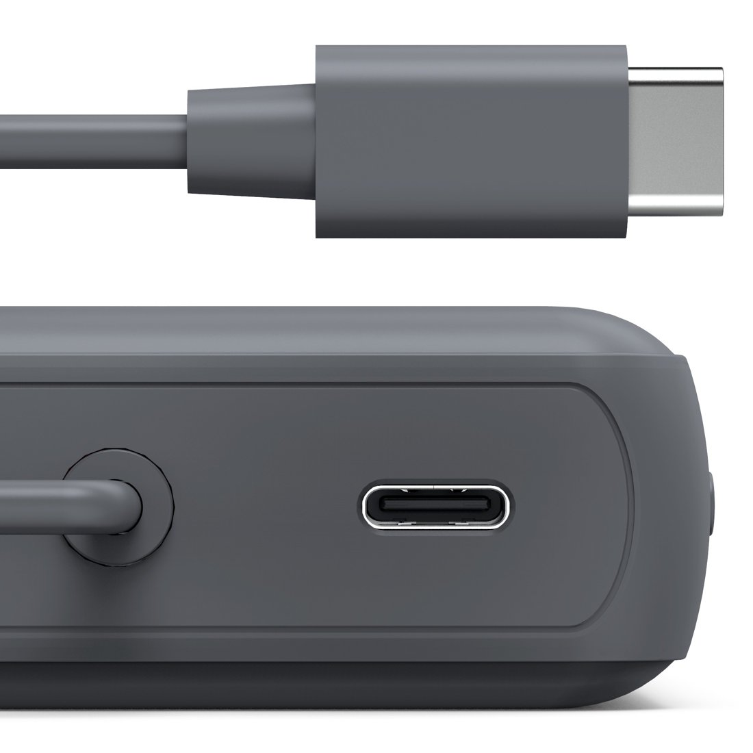 Szary kabel USB-C nad szarym urządzeniem z portem USB-C.