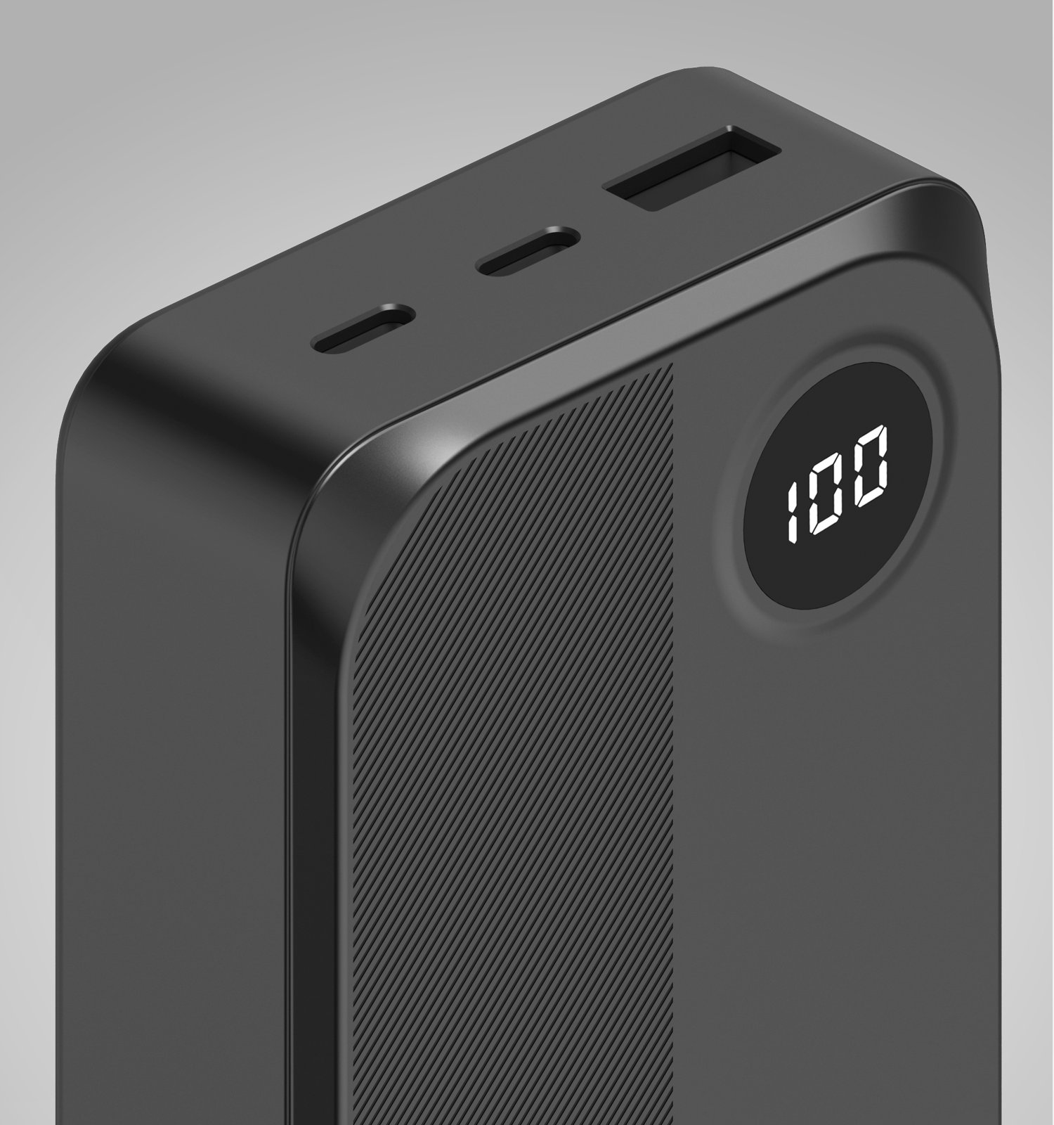 Power bank nera al 100% di carica, con porte USB e area texturizzata.