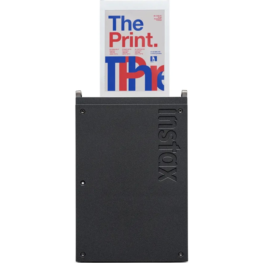 Üzerinde "The Print." yazan bir kağıtla siyah bir yazıcı.