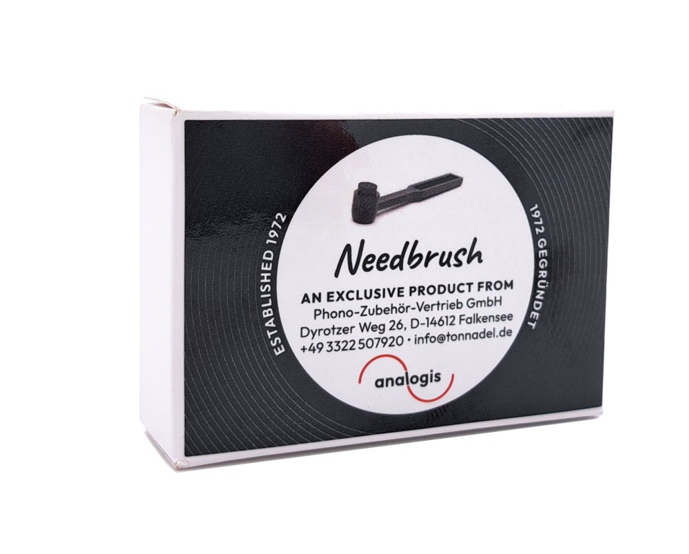 Verpackung für Needbrush, mit Firmenadresse und Logo.