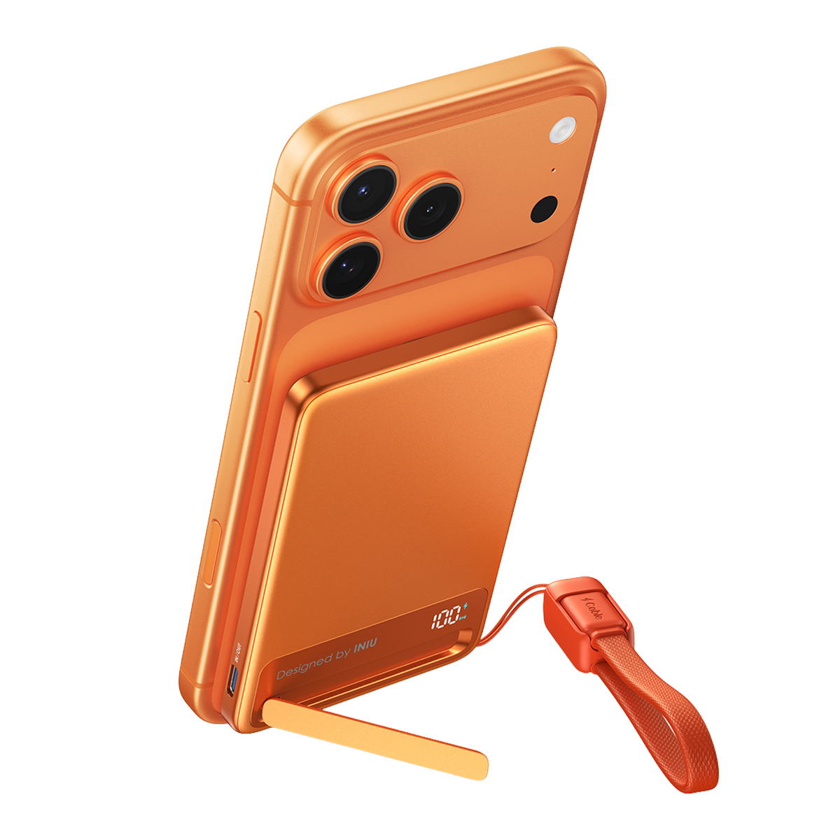 Teléfono inteligente naranja con estuche de carga y soporte.