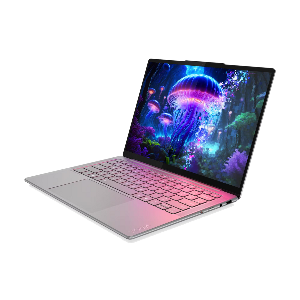Portátil plateado con arte de pantalla de medusas brillantes. Teclado brilla en rosa.