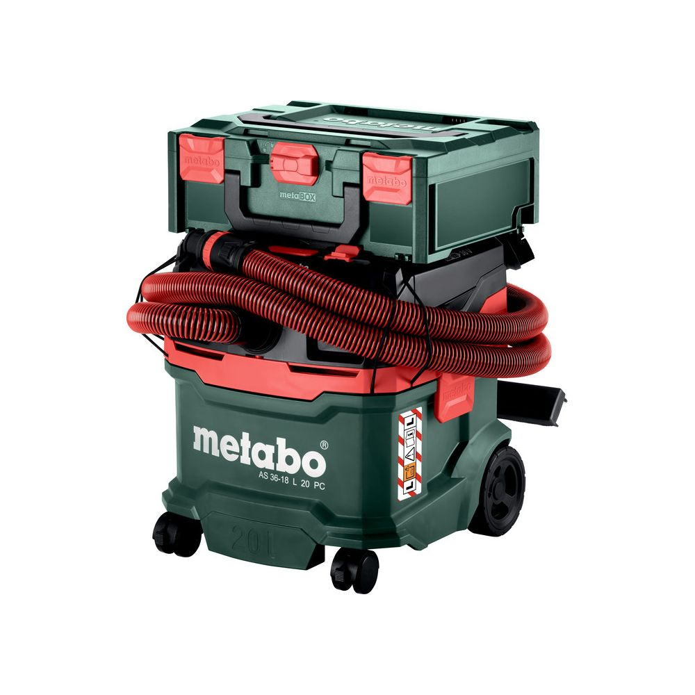 Aspirapolvere Metabo verde con tubo rosso e cassetta degli attrezzi verde sopra.