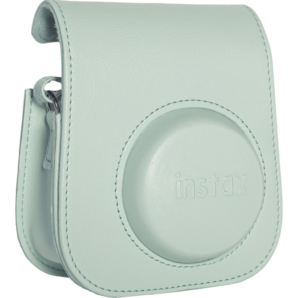Kabartmalı "instax" logolu açık yeşil deri kamera çantası.