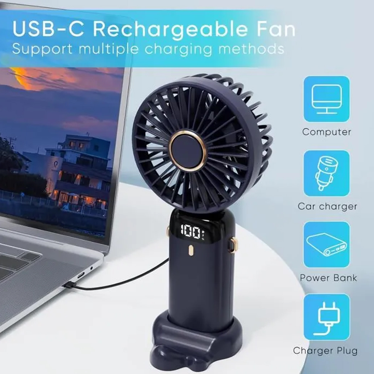 Ein dunkler USB-C-Ventilator mit Ständer, der an einen Laptop angeschlossen ist.