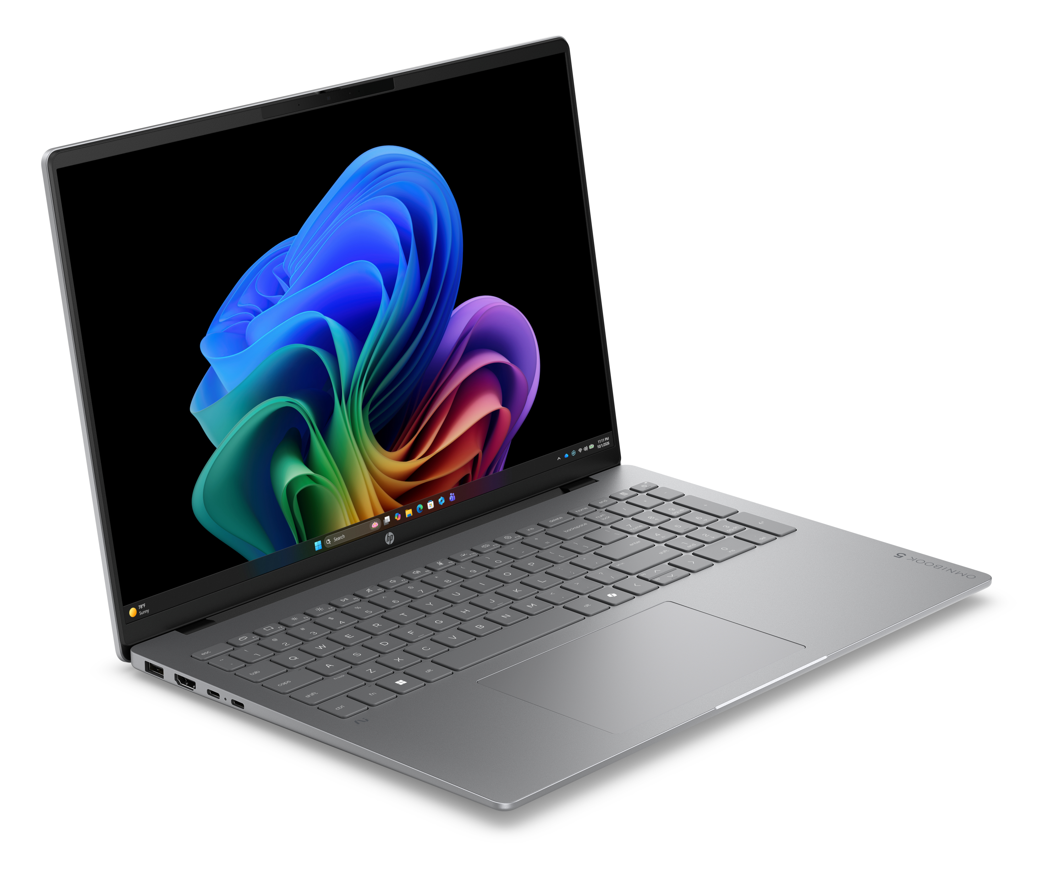Un laptop argentato con uno sfondo colorato sullo schermo.