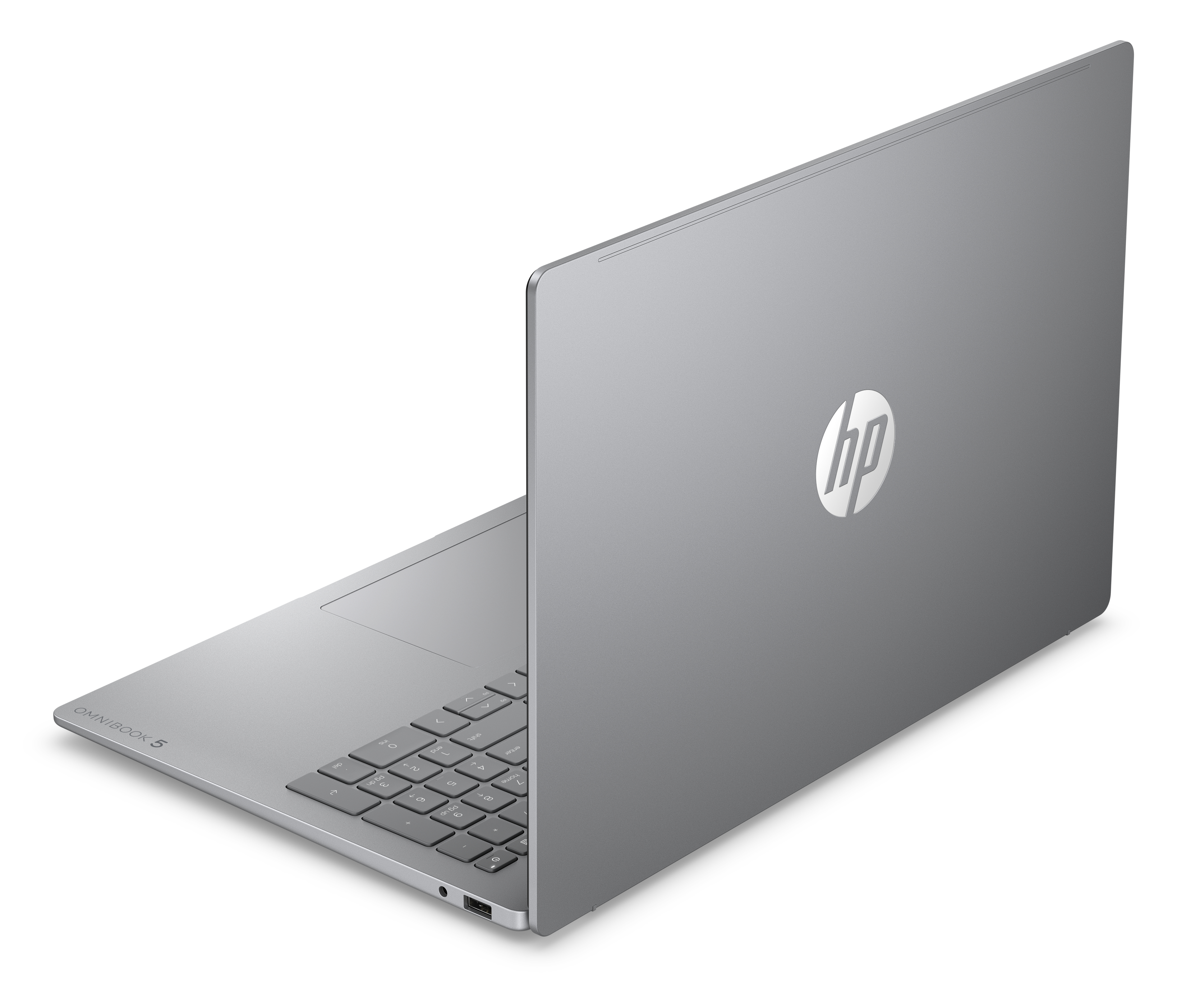 Un laptop HP Omnibook 5 argentato, che mostra la tastiera e il logo HP.