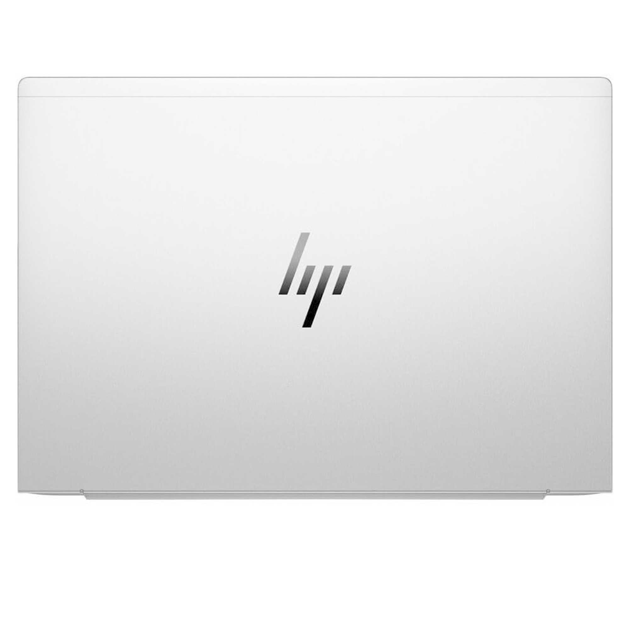 Ortasında HP logosu bulunan kapalı beyaz dizüstü bilgisayar.