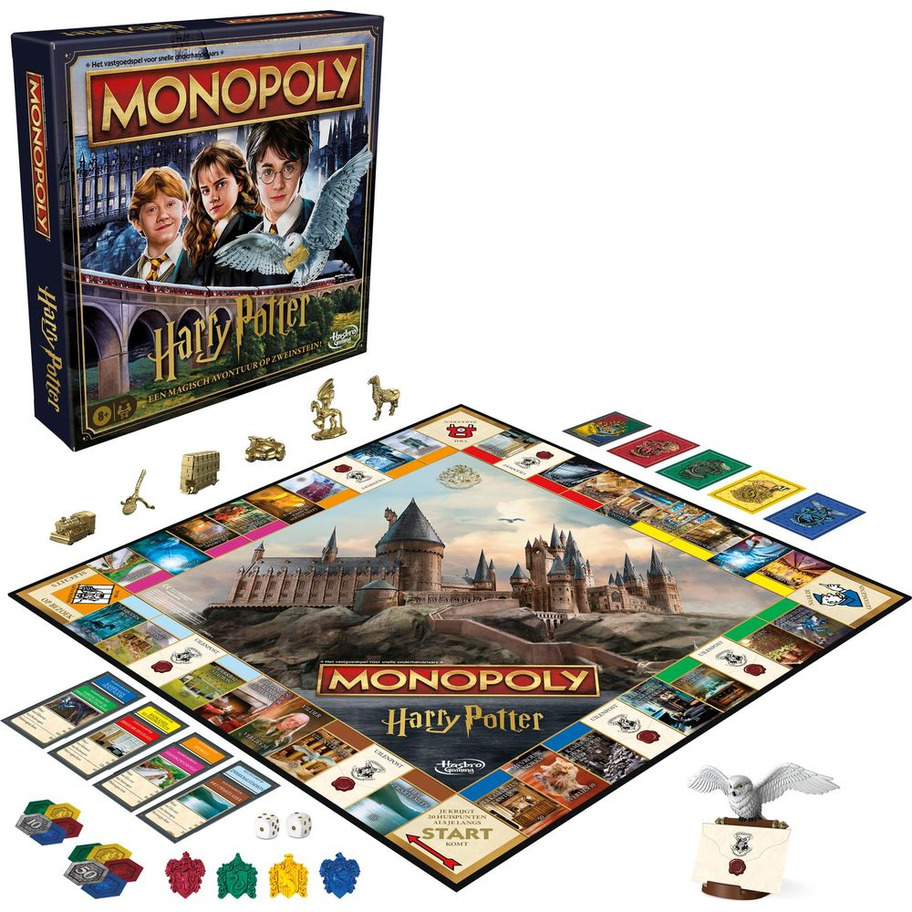 Plateau de Monopoly Harry Potter avec jetons, cartes et dés.