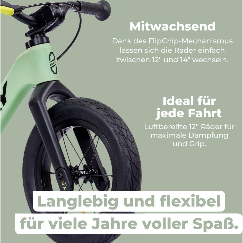 Ein hellgrünes Kinderfahrrad mit schwarzer Gabel und 12-Zoll-Rad.