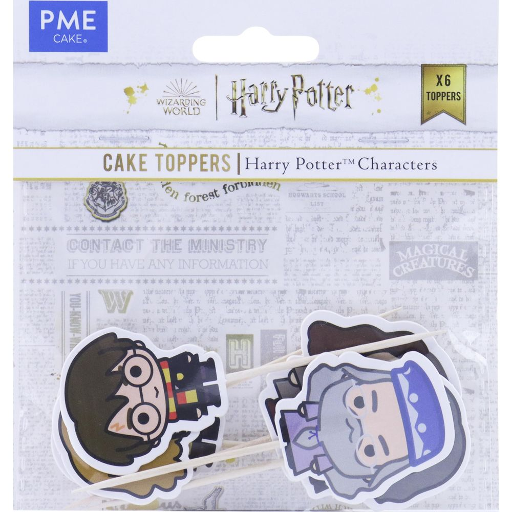 Harry Potter Kuchenaufsätze mit Harry und Dumbledore auf Zeitungshintergrund.
