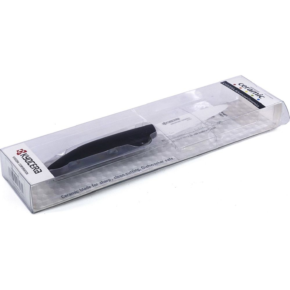 Kyocera Keramikmesser in transparenter Verpackung, schwarz-weißer Griff.