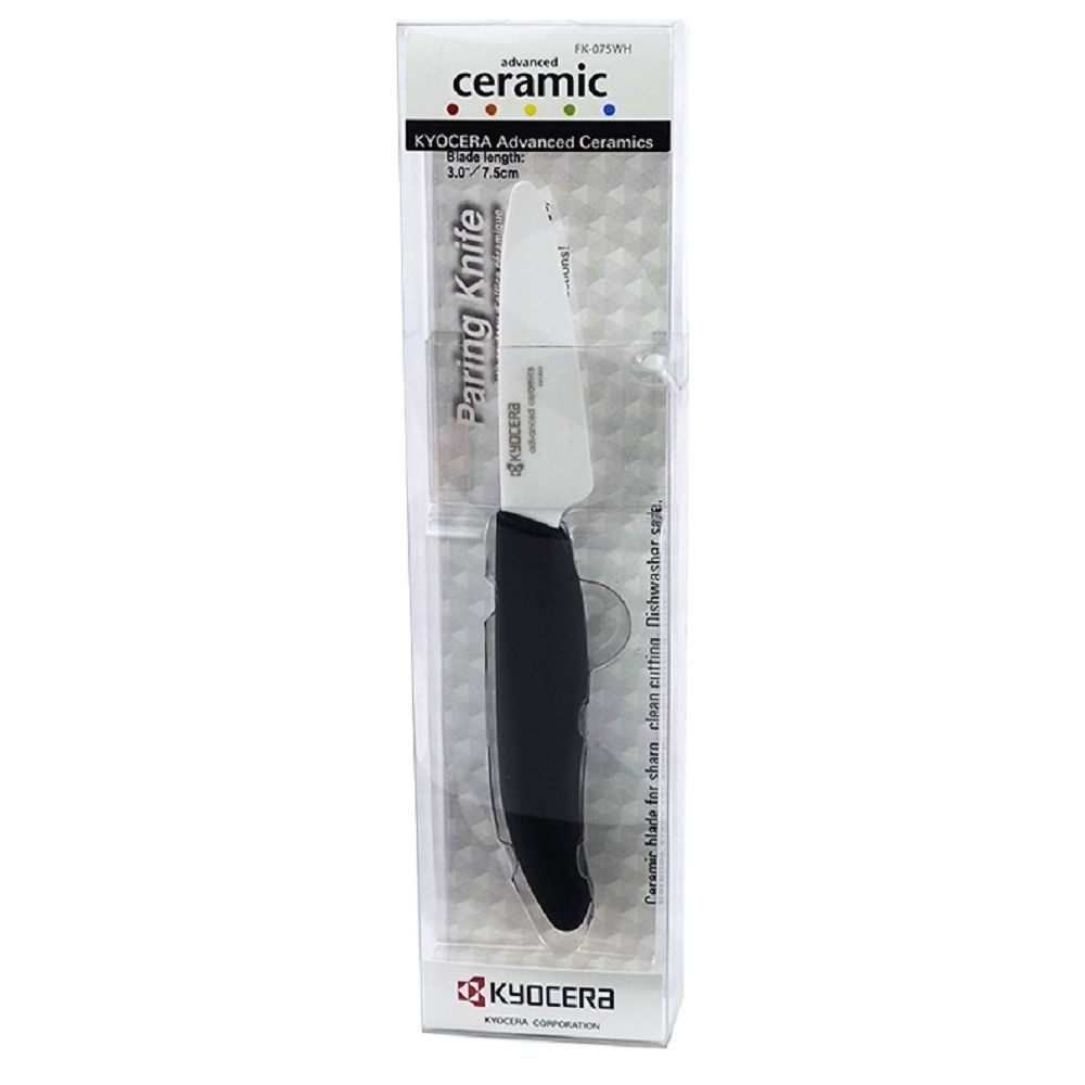 Ein Kyocera Keramik-Schälmesser in Verpackung, mit schwarzem Griff.