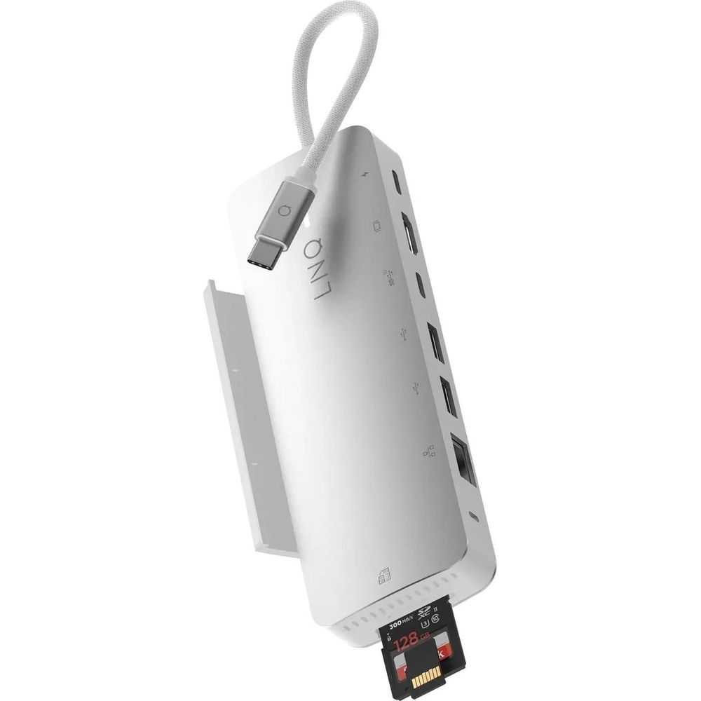 Hub USB-C bianco con slot per scheda SD e più porte.
