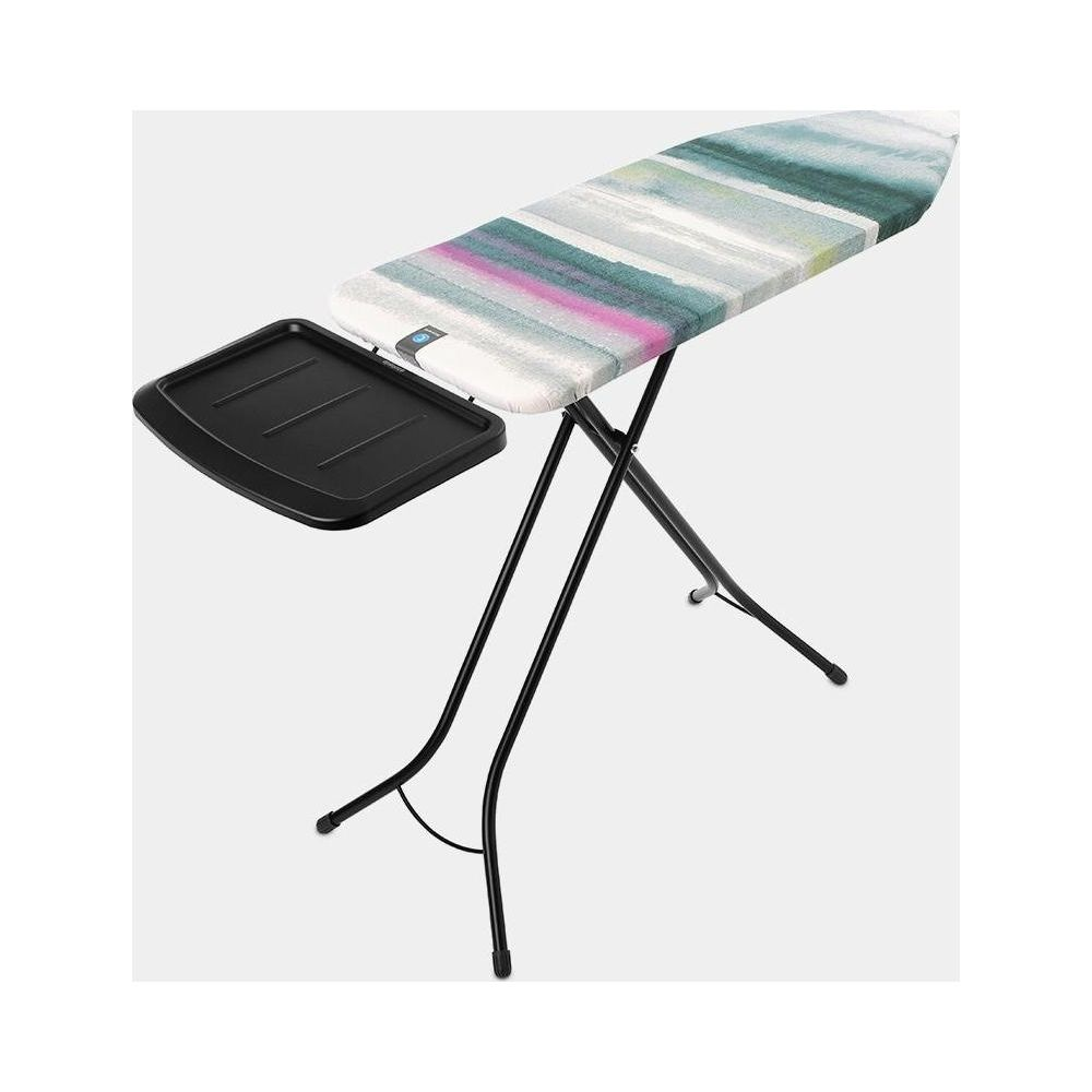 Ironing board with striped cover and black frame.