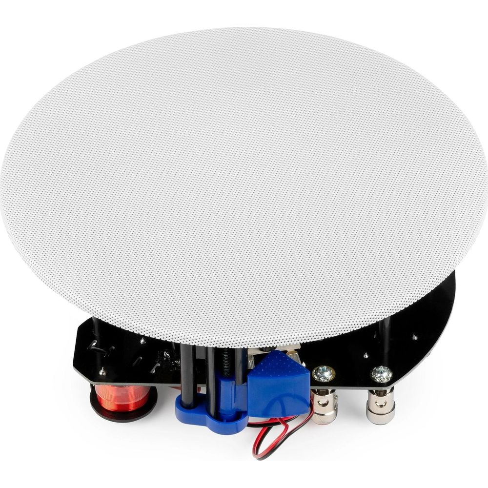 Un altavoz blanco redondo con base negra y componentes electrónicos.