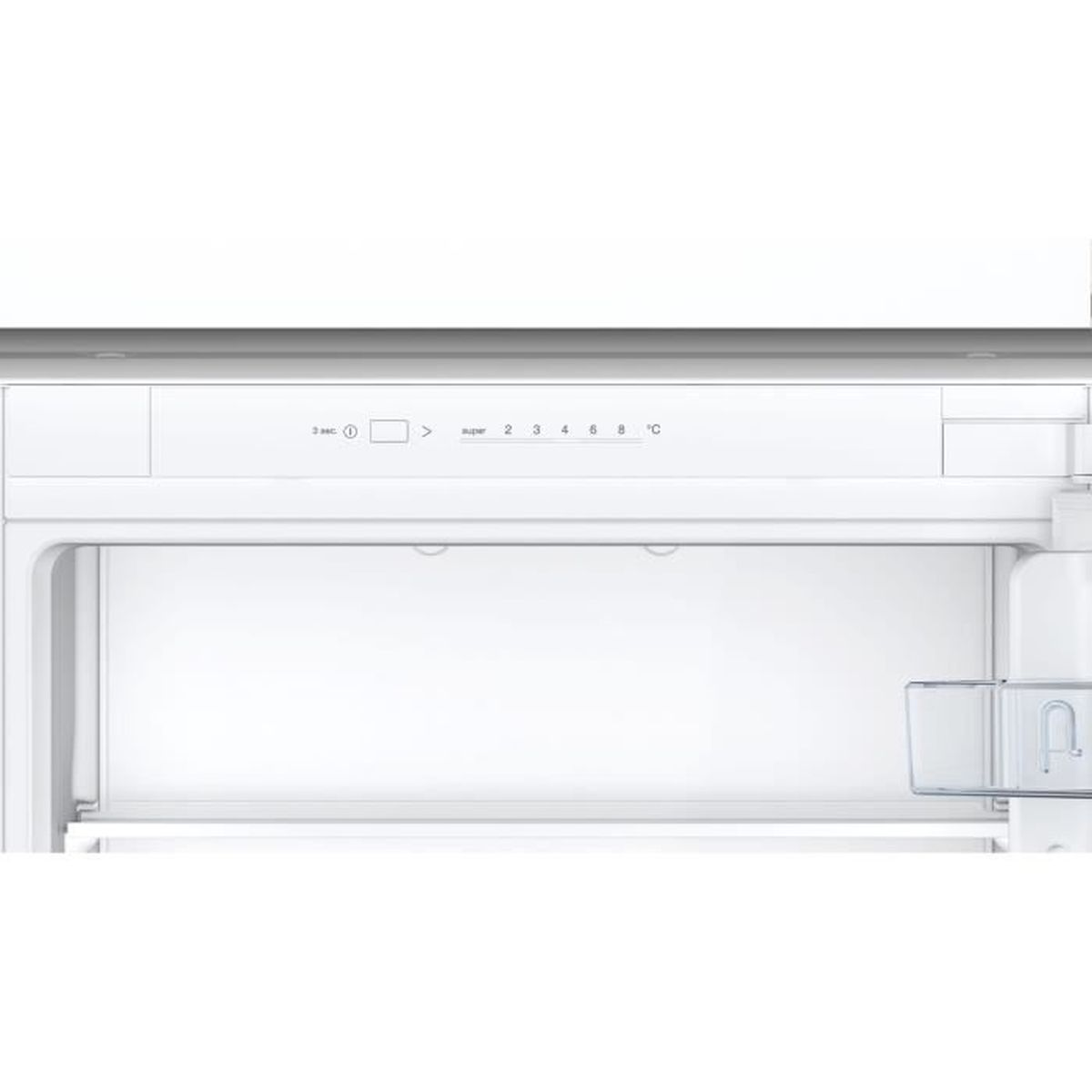 Interno bianco di frigorifero con display digitale della temperatura e piccolo scomparto.