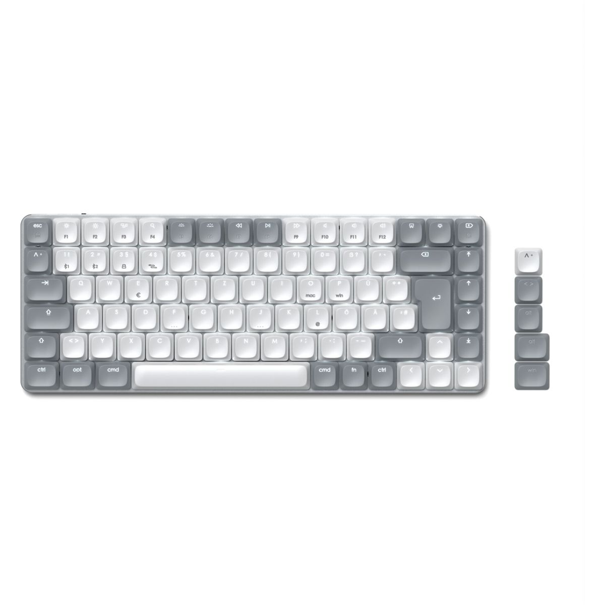 Eine graue Tastatur mit weißen und hellgrauen Tasten auf weißem Hintergrund.