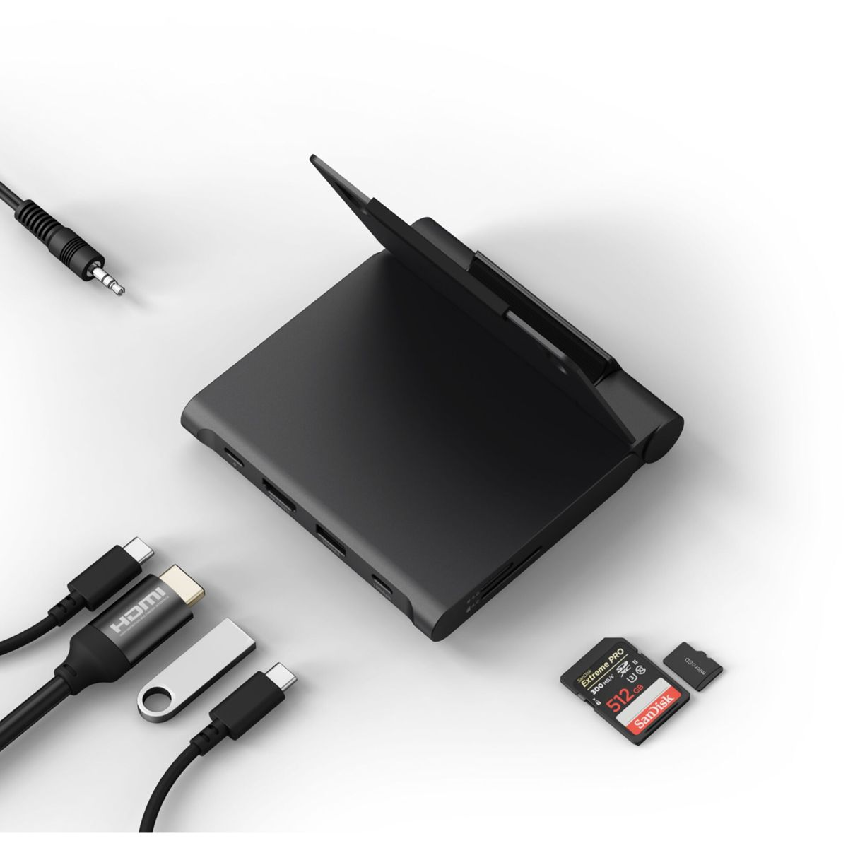 Hub nero per laptop con cavi USB-C, adattatore HDMI, unità USB e scheda SD.