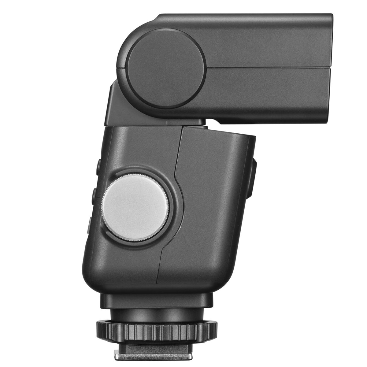 Unità flash fotocamera grigio scuro con ghiera argentata su sfondo bianco.