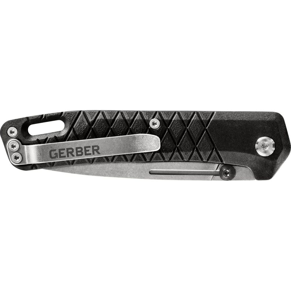 Una navaja plegable negra Gerber con clip plateado y mango texturizado.