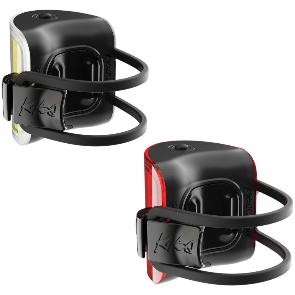 Zwei Fahrradlichter, eines weiß, eines rot, mit schwarzen Halterungen.