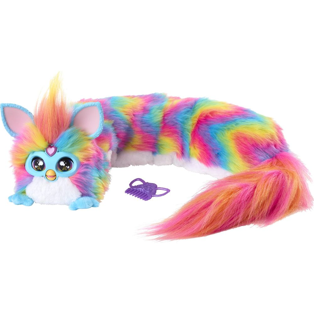 Ein buntes Furby-Spielzeug mit Regenbogenfarben und einem lila Kamm.
