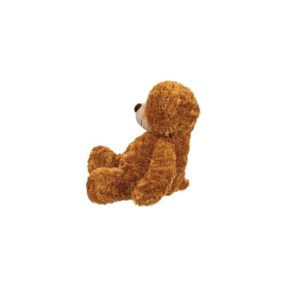 Ein flauschiger brauner Teddybär sitzt auf weißem Grund nach links blickend.