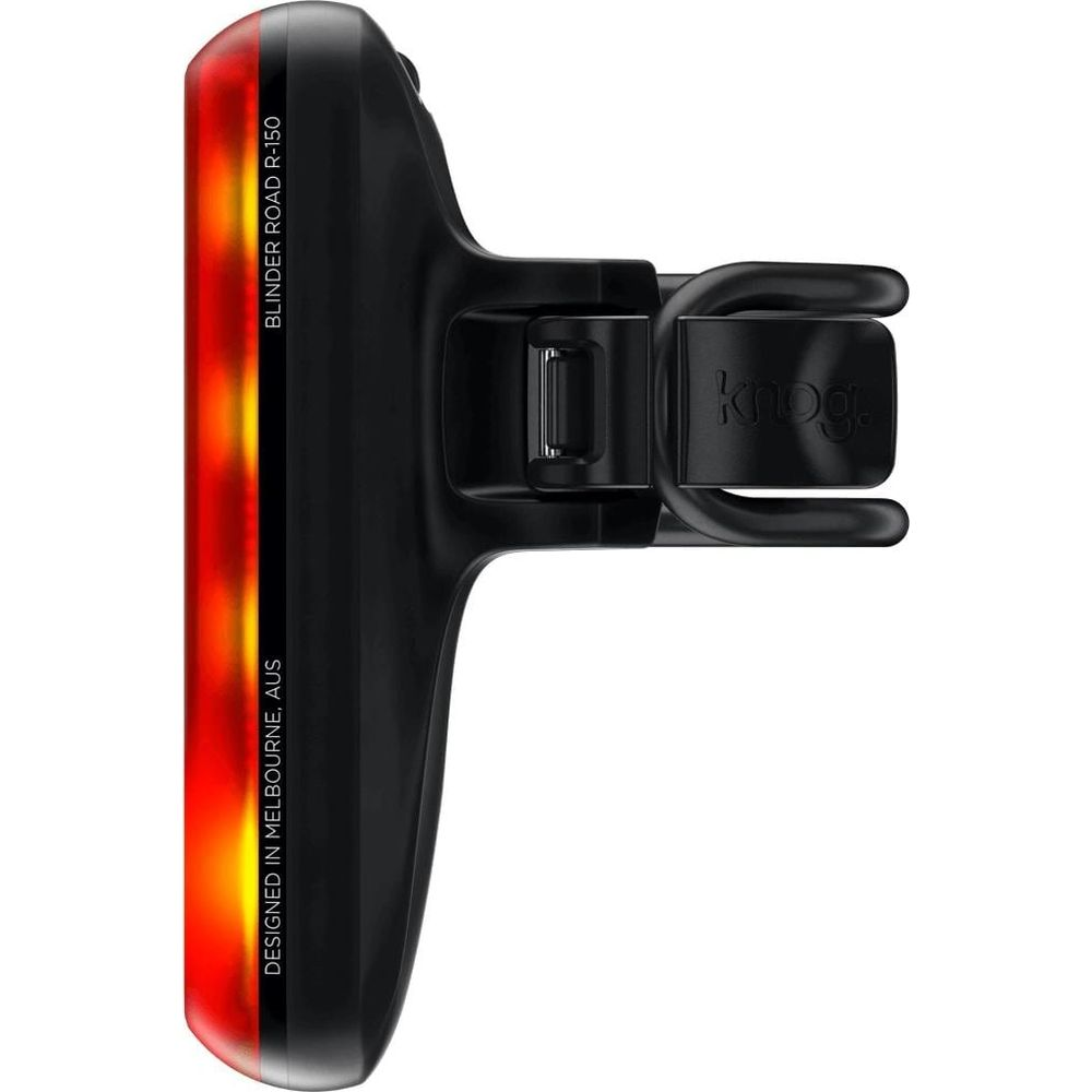 Schwarzes Fahrradlicht mit rot/orangen LEDs. Text lautet 'knog'.