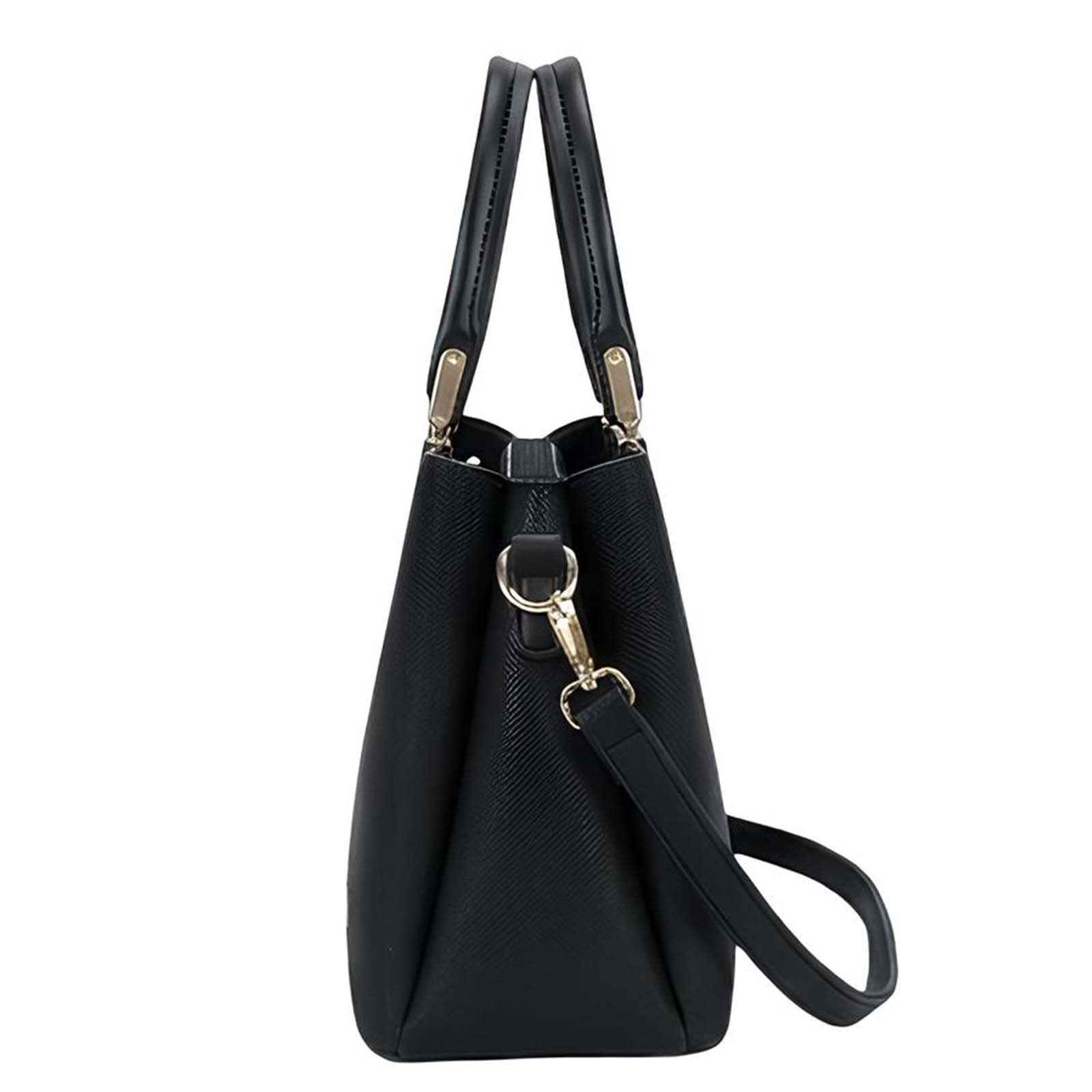 Bolso negro con asas superiores y correa de hombro desmontable.