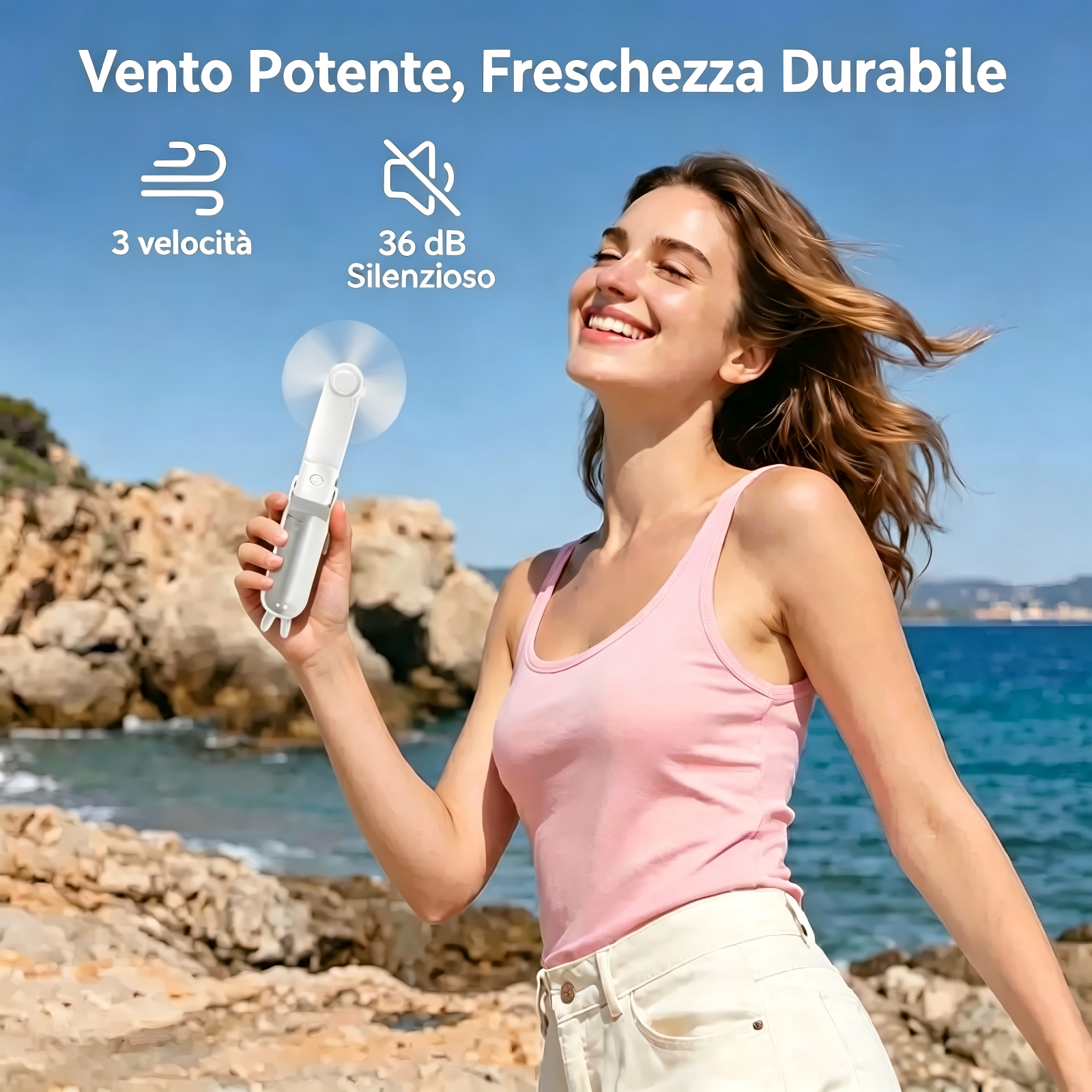 Donna tiene ventilatore in spiaggia. Vento forte, 3 velocità, silenzioso.