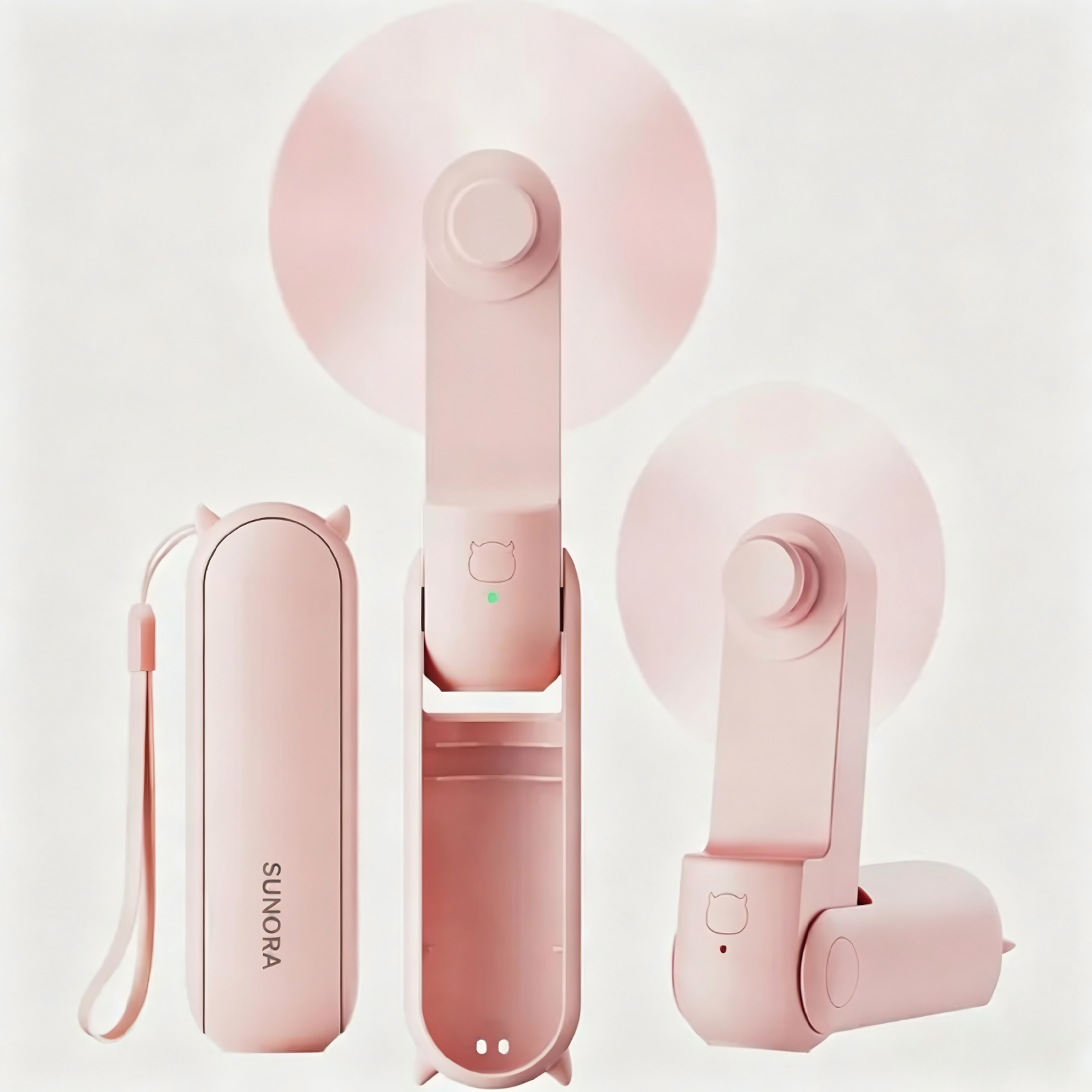 Tre ventilatori rosa pieghevoli con dettagli orecchie e pale.