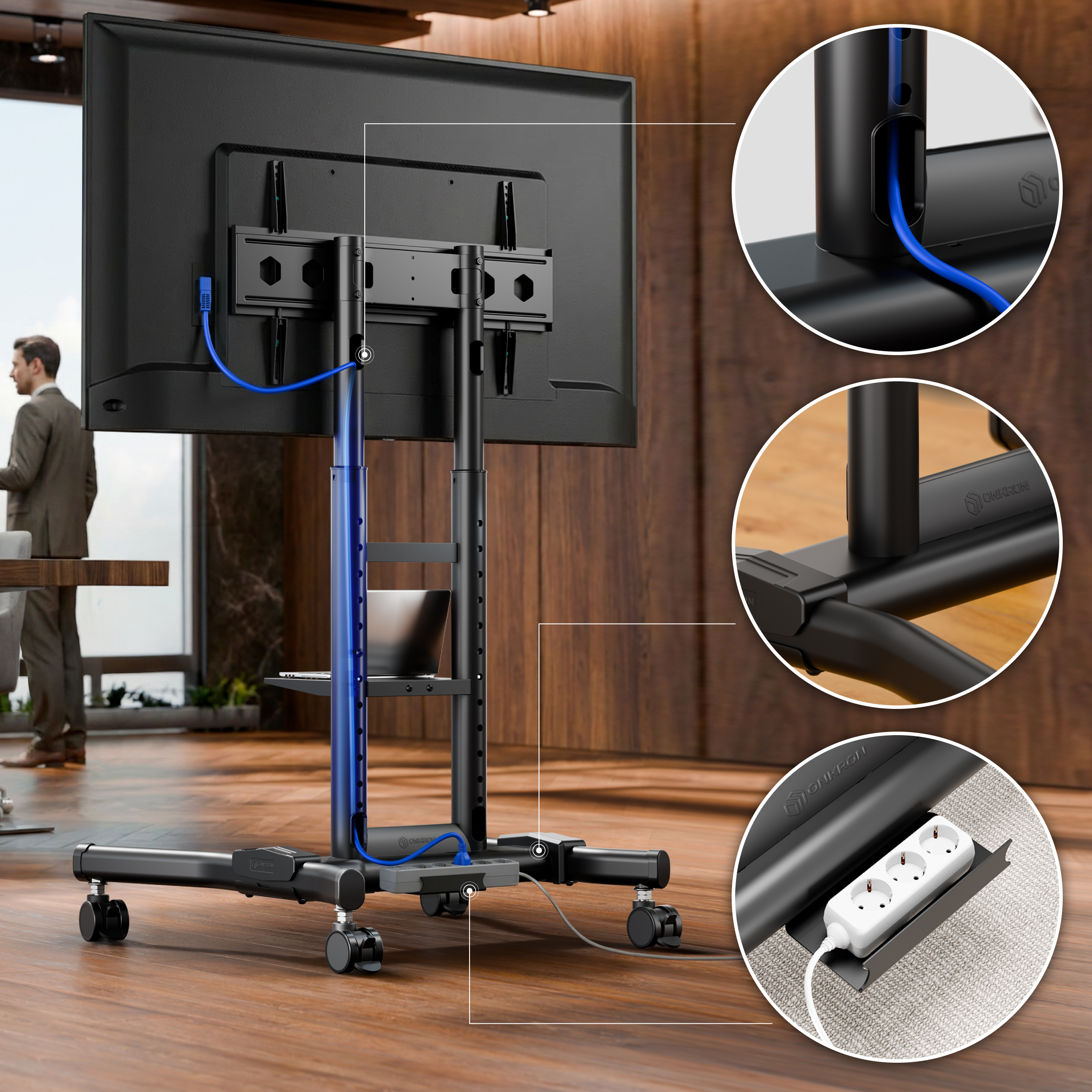 Un soporte de TV móvil con gestión de cables y regleta.