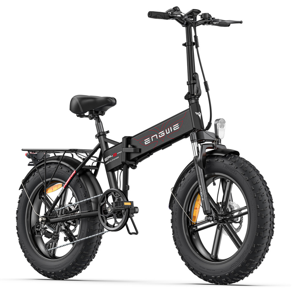 Una bicicleta eléctrica plegable negra con neumáticos anchos y portaequipajes.