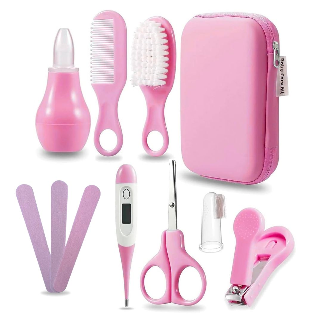 Un kit de cuidado para bebé rosa con aspirador nasal, peine, cepillo, termómetro, tijeras, limas, cepillo de dientes y cortaúñas.