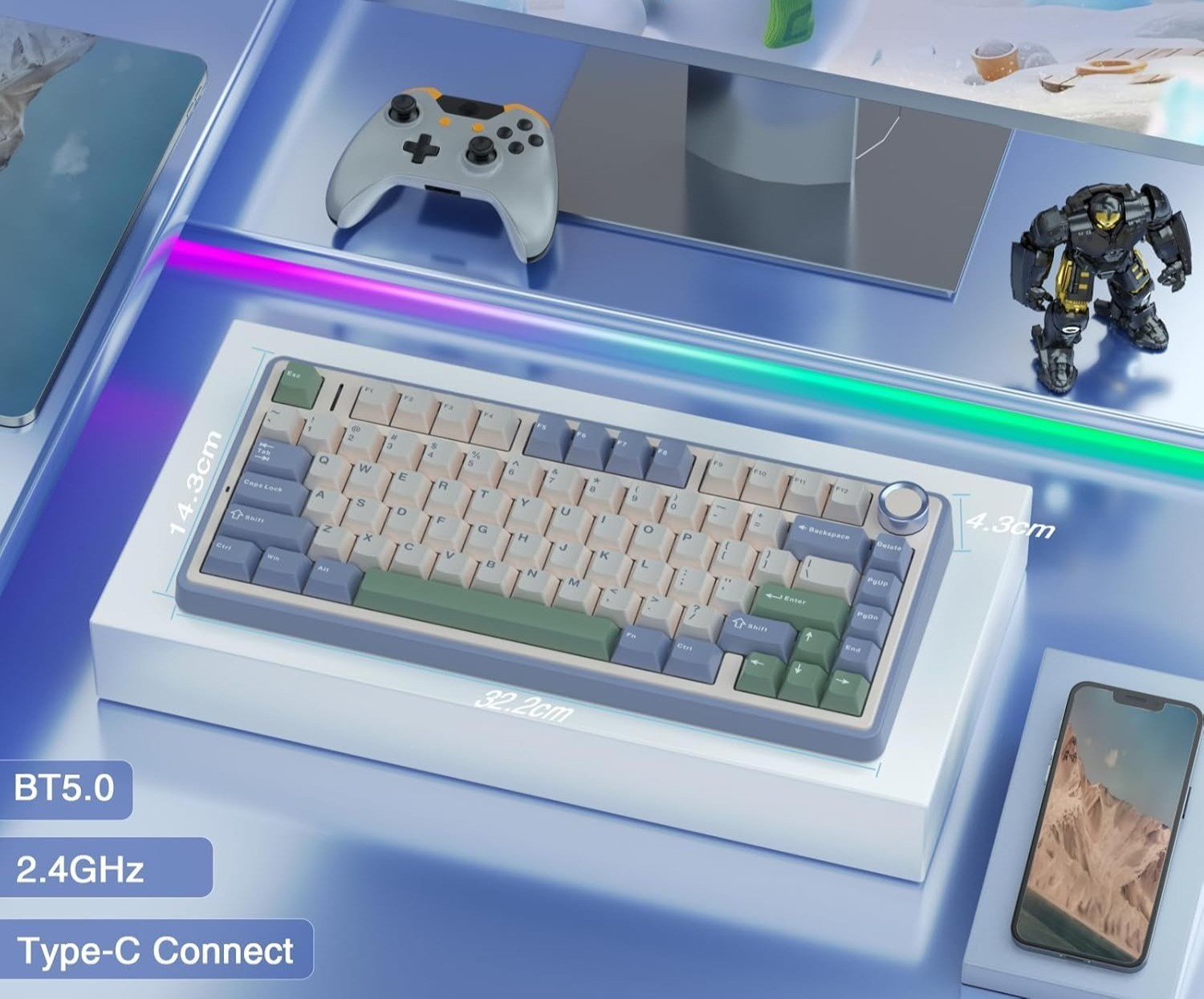 Klawiatura z podświetleniem RGB, kontroler, robot i smartfon na biurku.