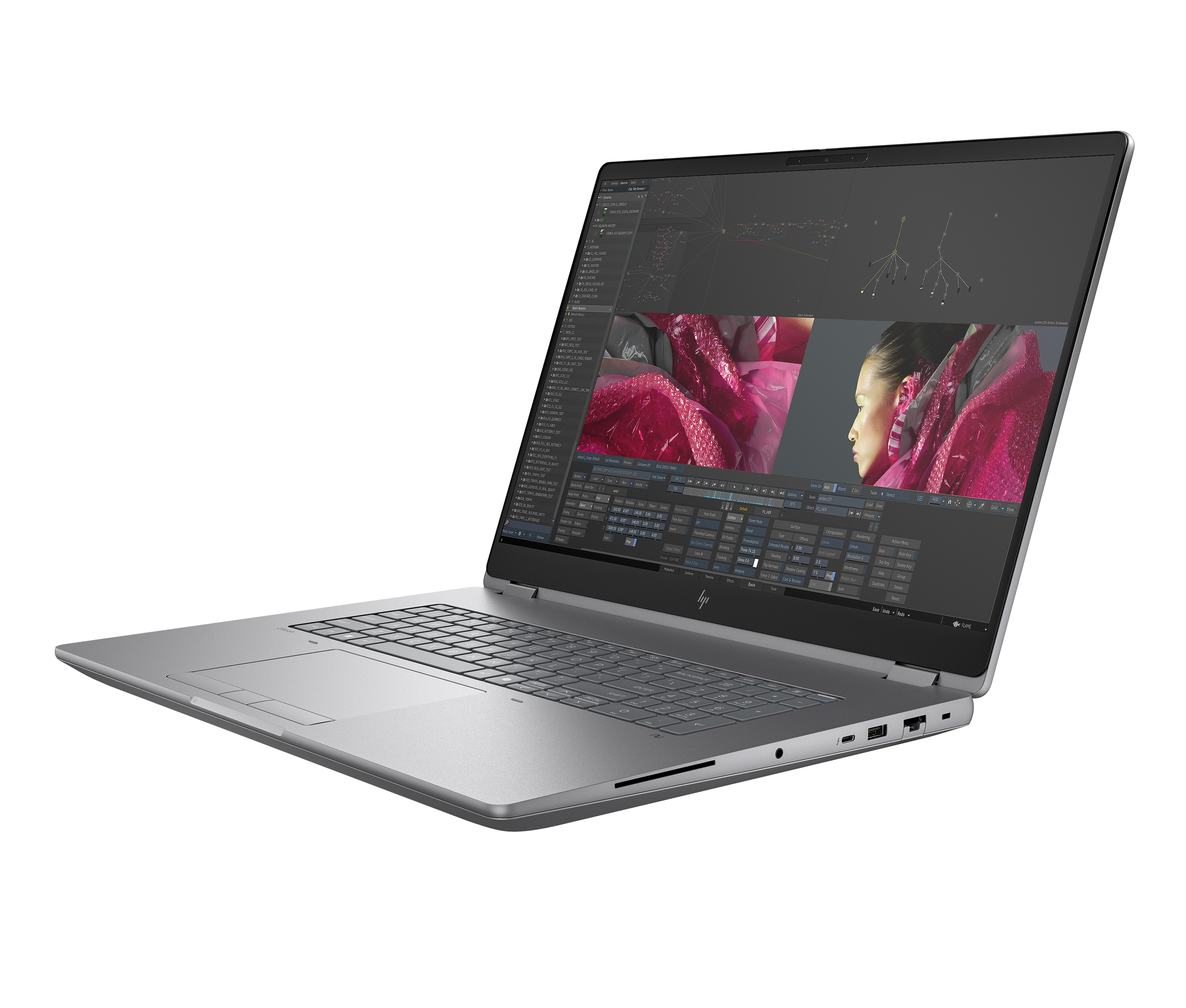 A silver laptop with an open screen displaying a complex user interface.