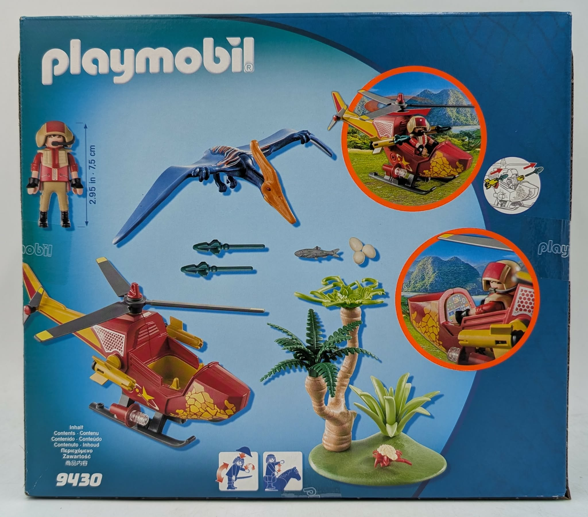 Playmobil box showing a pilot, helicopter, pterodactyl, fish, and eggs.