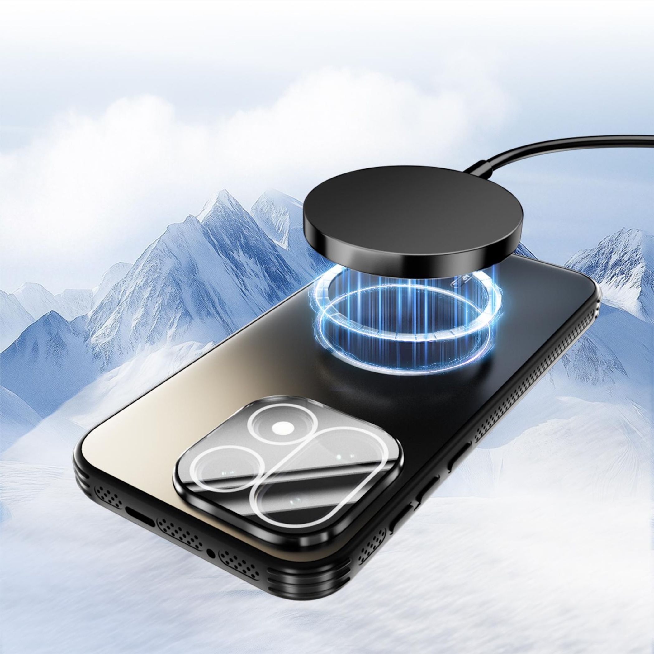 Schwarzes Smartphone mit magnetischem Ladegerät vor verschneiten Bergen.