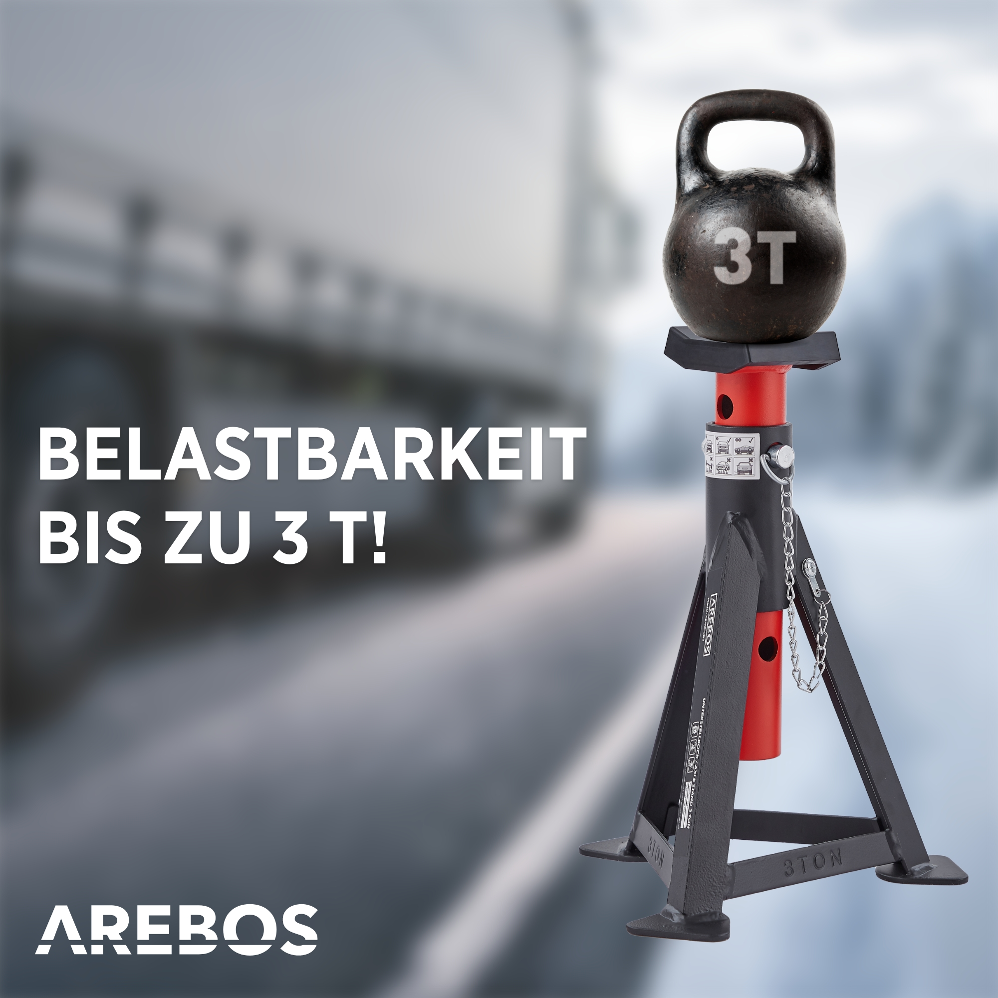 Ein schwerer 3T Kettlebell auf einem roten und schwarzen AREBOS Wagenheber-Ständer.