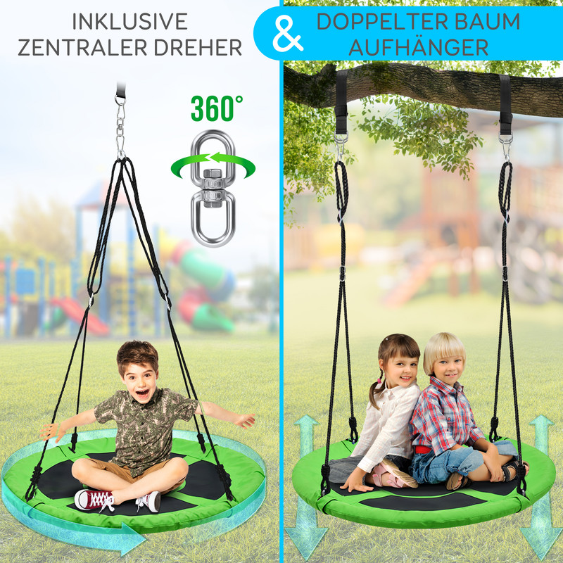 Kinder schwingen auf einer runden, grünen Schaukel mit Bäumen und Spielplatz im Hintergrund.