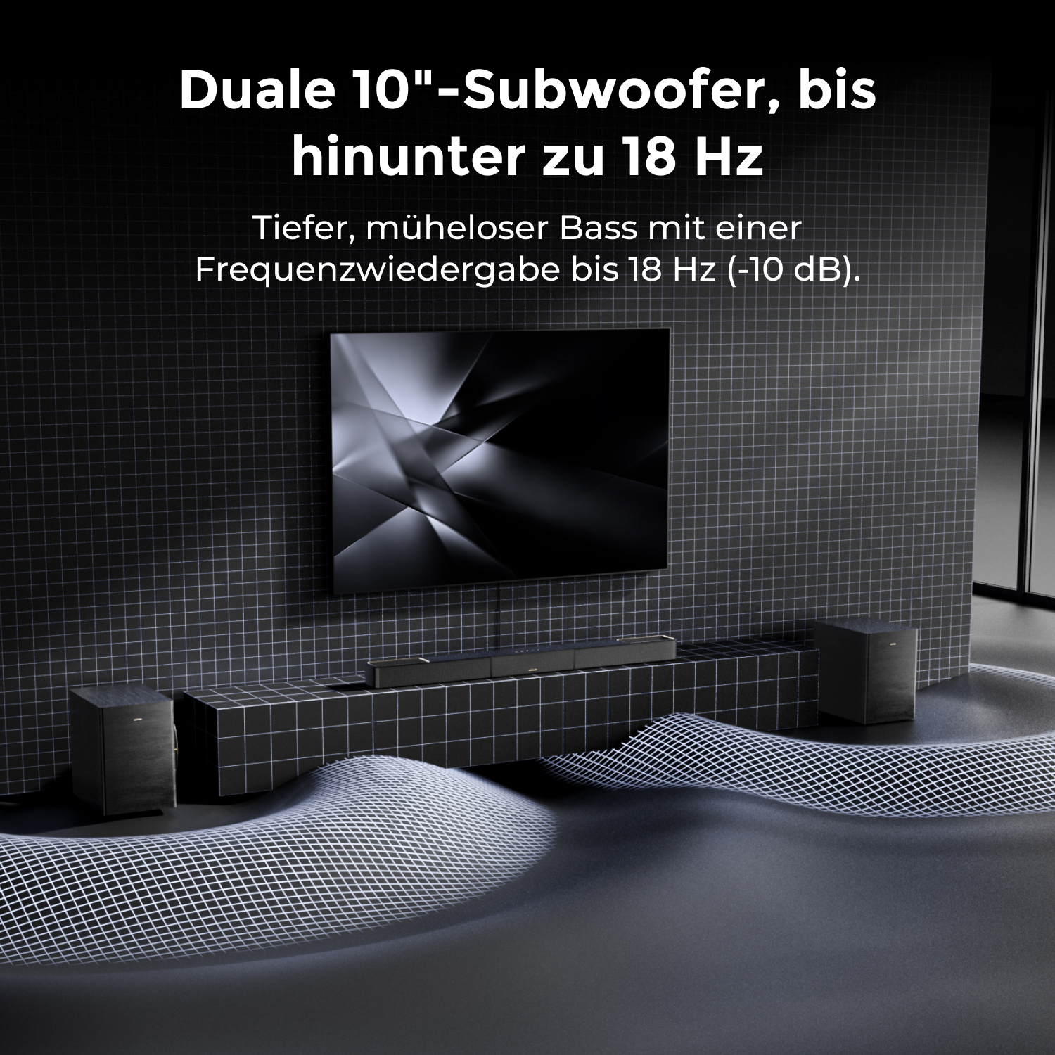 Habitación negra con TV de pantalla plana, barra de sonido y dos subwoofers.
