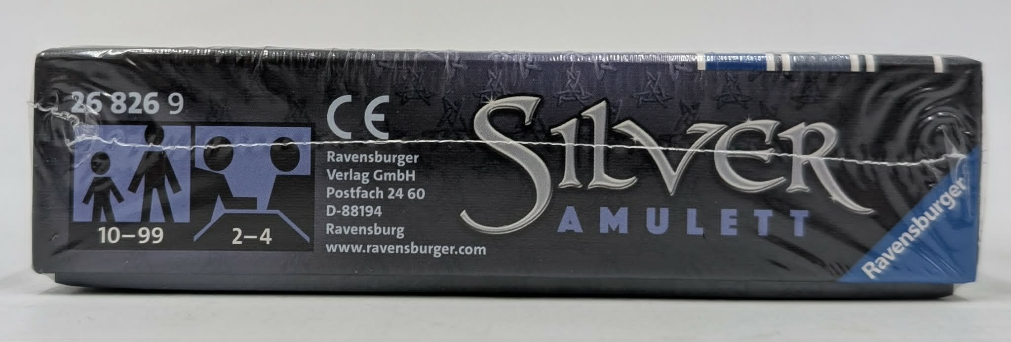 Schwarze Spielschachtel mit dem Titel 'Silver Amulett' von Ravensburger.