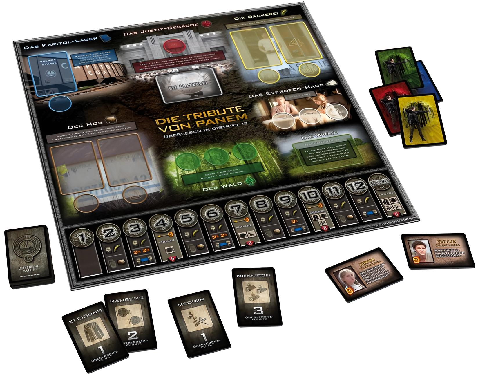 Das Brettspiel "Die Tribute von Panem" mit Karten und Spielfiguren auf einem Tisch.