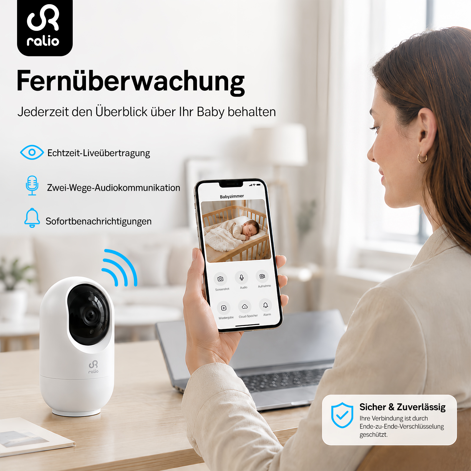 Eine Frau benutzt ein Babyphone-System mit Kamera und App zur Fernüberwachung.