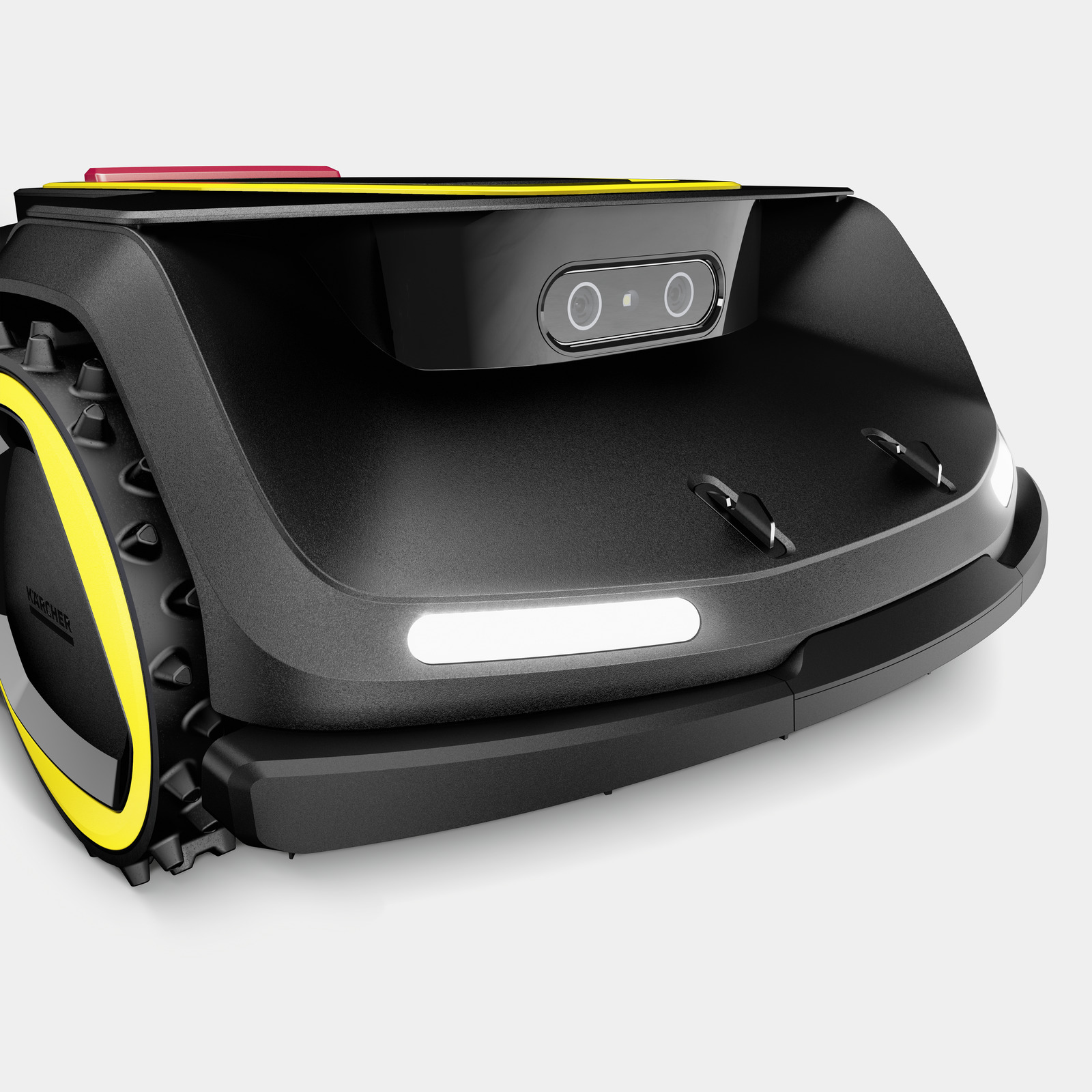 Un robot tosaerba nero con accenti gialli e telecamere.